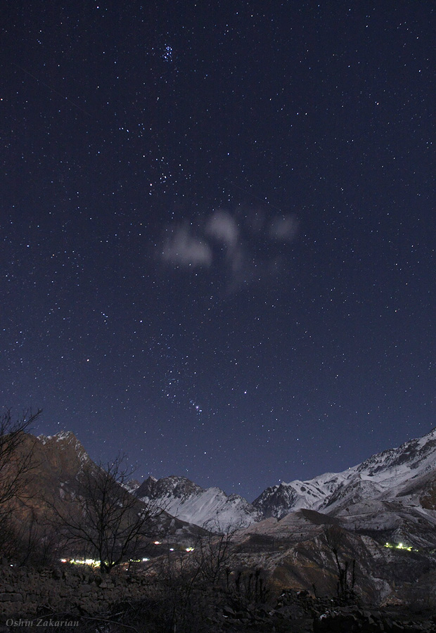 Orion Rises above Snowy Peaks