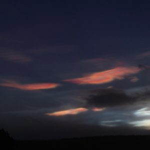 The Moon and Nacreous Clouds