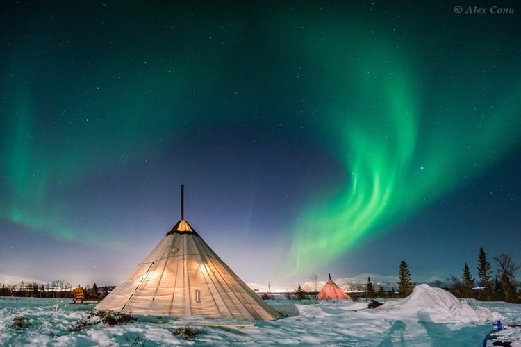Northern Lights above Sami Tents