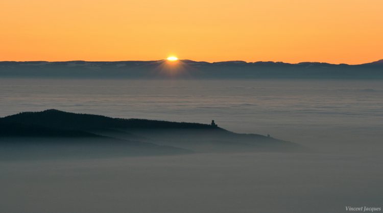 Sunrise Above a Sea of Clouds