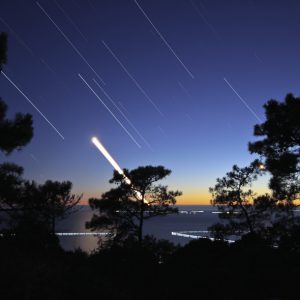 Moon and Saturn falling in the Ocean