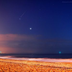 Jupiter and Venus over Normandy Coast