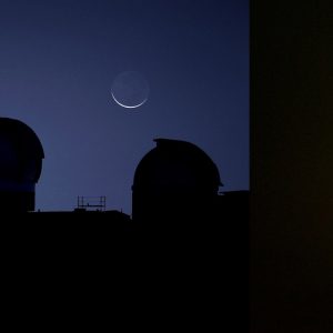Comet PanSTARRS over PanSTARRS Telescopes
