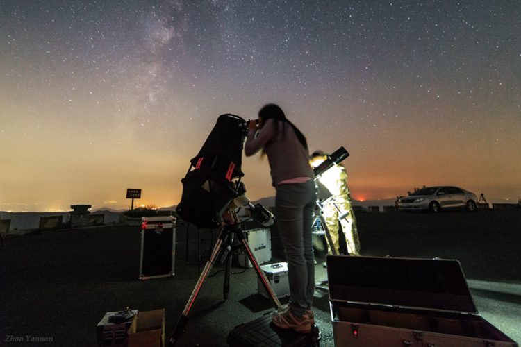 Chinese Amateur Astronomer Observing the Night Sky