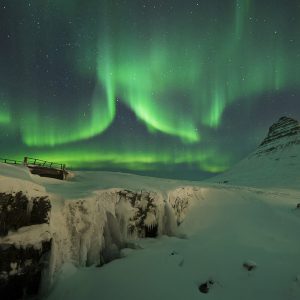 The Aurora Mimics the Shape of the Mountain