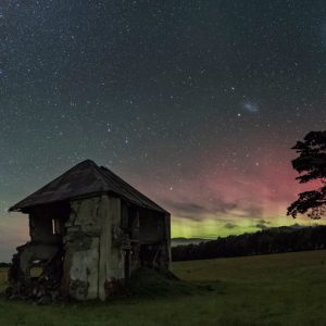 House, Tree and Milky Way Under Aurora