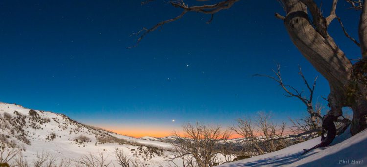 Planets Align Over Snowy Mountains