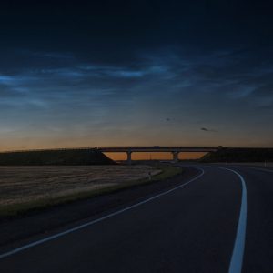 Night Drive Under Noctilucent Clouds