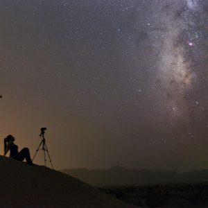 Astrophotographer and the Milky Way