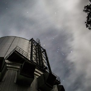 Orion Peeks on a Moonlit Dome
