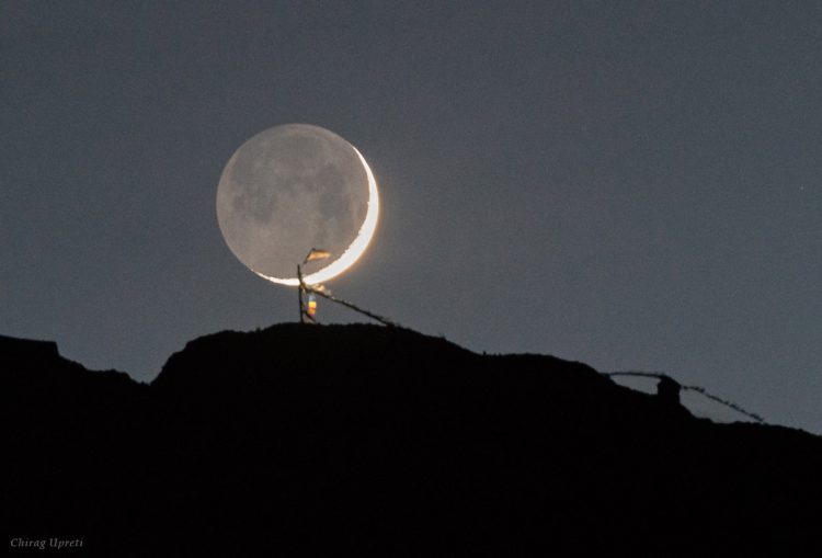 Moonset Behind Tibetan Prayer Flags