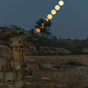 Full Moon Rising Behind Ruins of Old Copper Mine