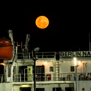 Moon Rising Above a Ferry