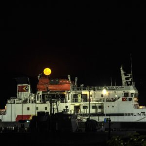 Moon Rising Above a Ferry
