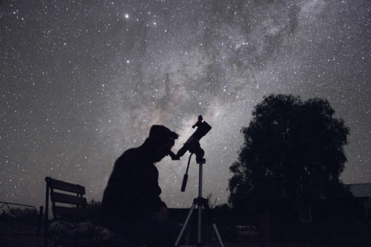 Amateur Astronomer and the Rising Milky Way
