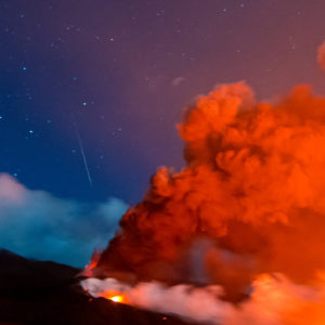 Orion, Meteor, and Erupting Volcano