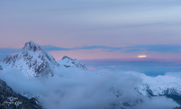 Full Moon Above Sea of Clouds