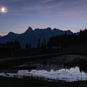 Crescent Moon Behind the Austrian Alps