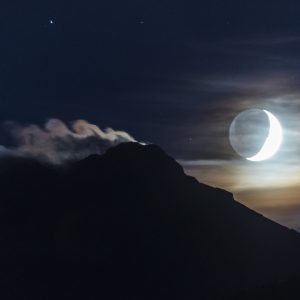 Crescent Moon and Kelvin Helmholtz Cloud