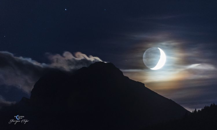 Crescent Moon and Kelvin Helmholtz Cloud