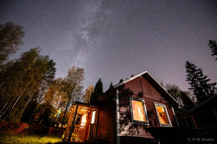 Moonlit Cabin Under the Milky Way