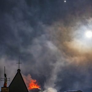 Church and Erupting Volcano
