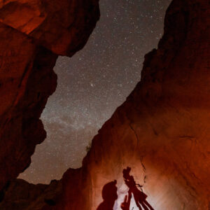 Night Photographer on the Bottom of a Canyon