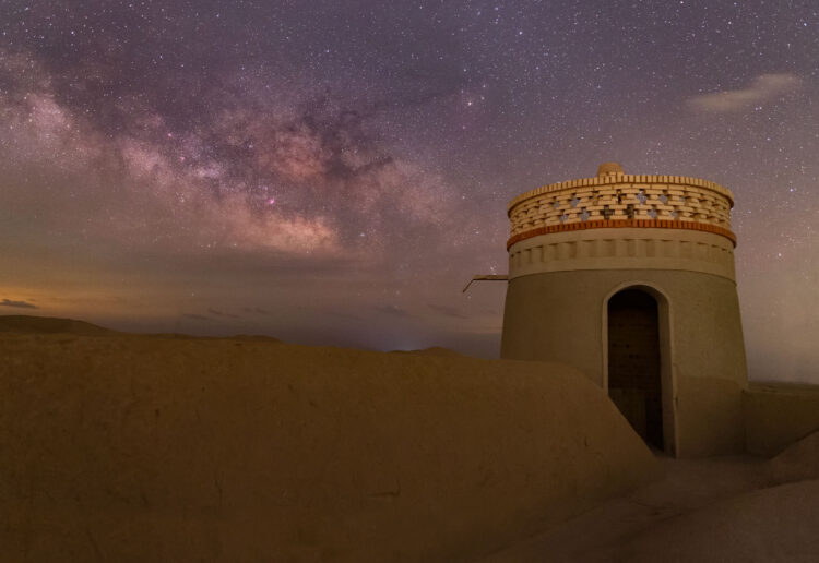 Watching the Galaxy Rise Through the Clouds