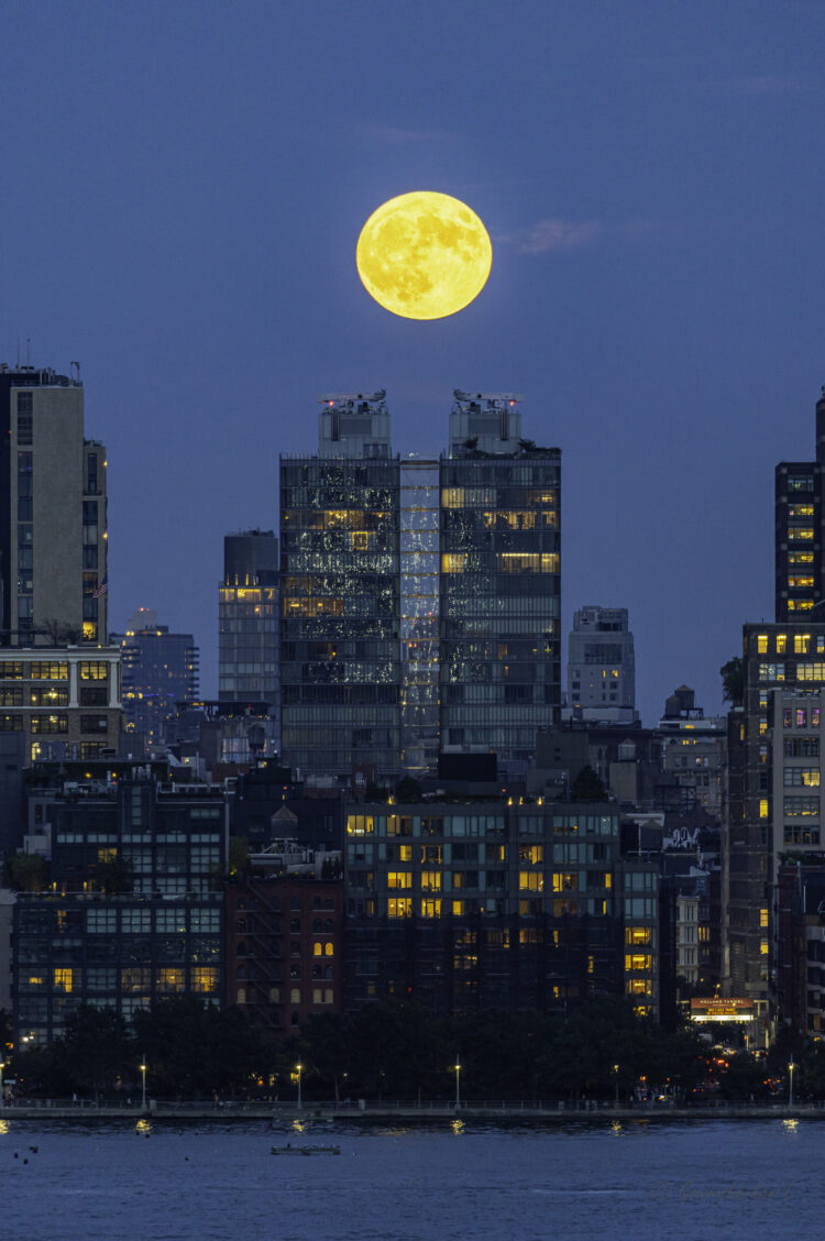 Full Harvest Moon Over Manhattan Skyline