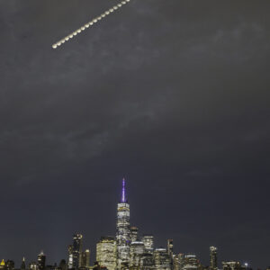 Partial Eclipse Composite with Freedom Tower