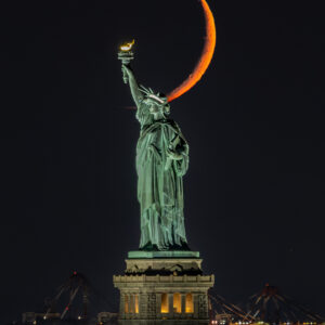 Crescent Moon Behind the Statue of Liberty