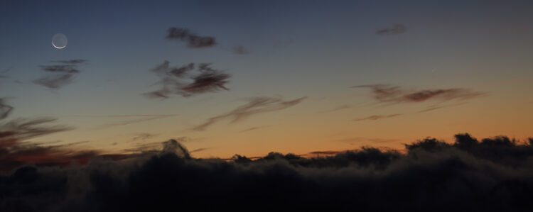 The Moon and the Comet Over a Cloudy Sea