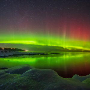 Aurora in Icy Landscape